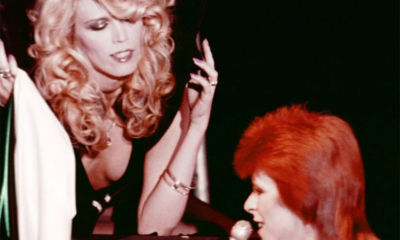 David Bowie and Amanda Lear performing on stage together