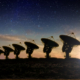 Radio telescopes point toward the night sky